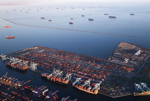 Container ships unloading in Long Bay port